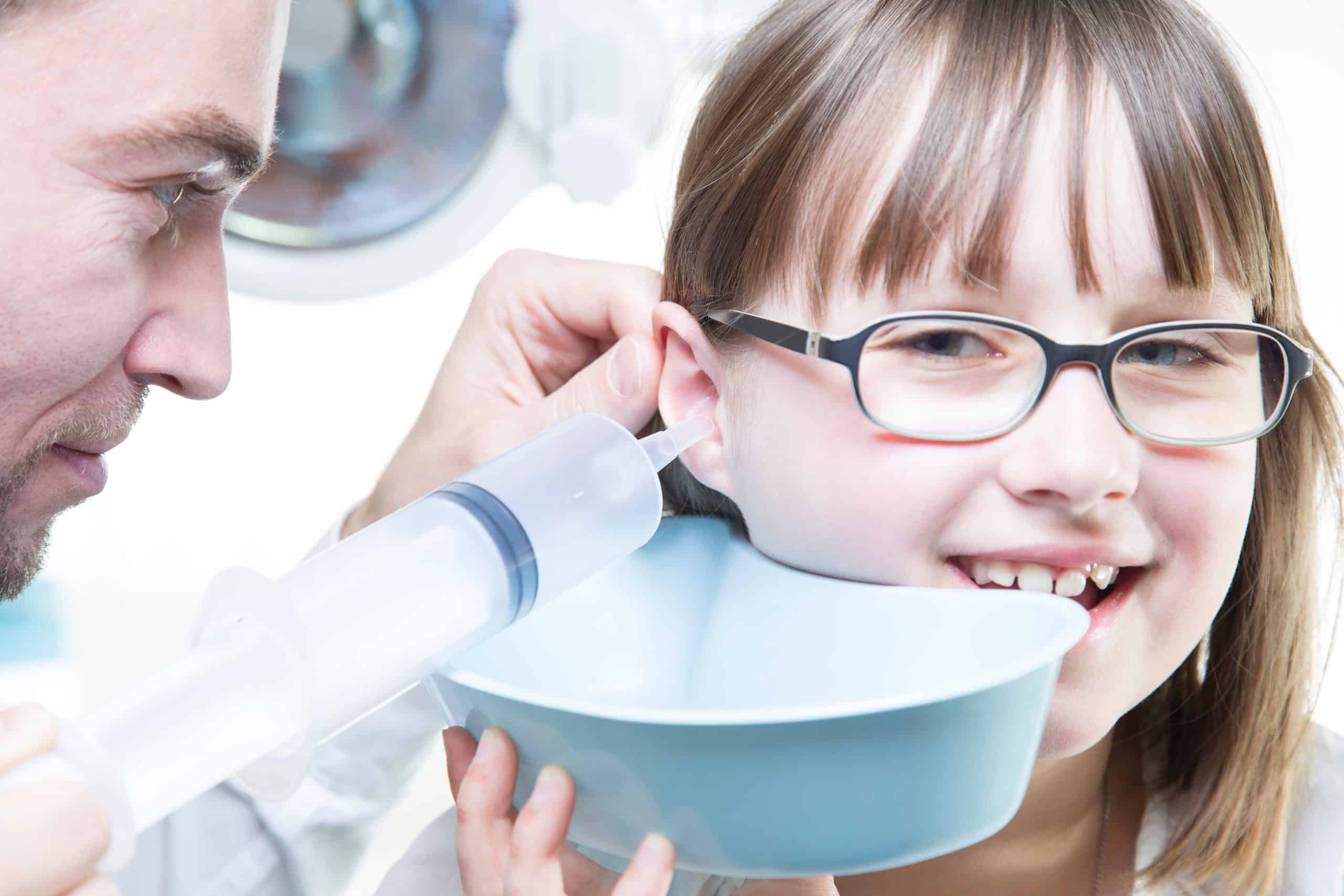 Ear,Irrigation,And,Earwax,Removal.,Young,Male,Laryngologist,Doctor,Performing