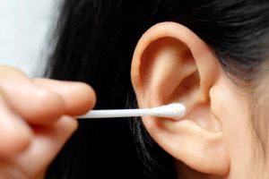 ear with earwax build-up affecting hearing