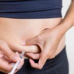 person injecting wegovy in the abdomen for weight loss
