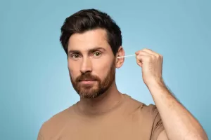 earache caused by earwax buildup