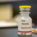 why flu vaccine may cause mild symptoms
